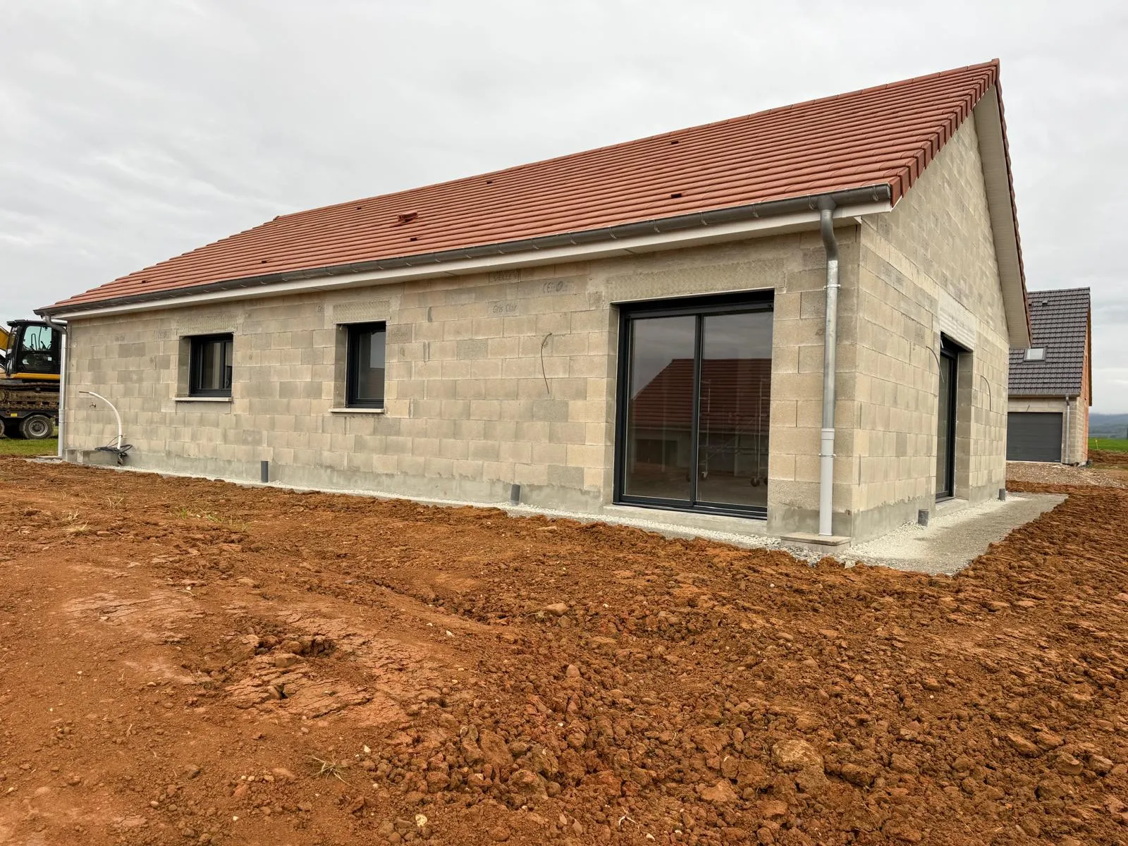 Maison avec charpente et toiture à Belfort — Maçonnerie Altan